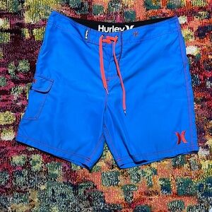 Hurley board shorts size 34. Blue and orange.